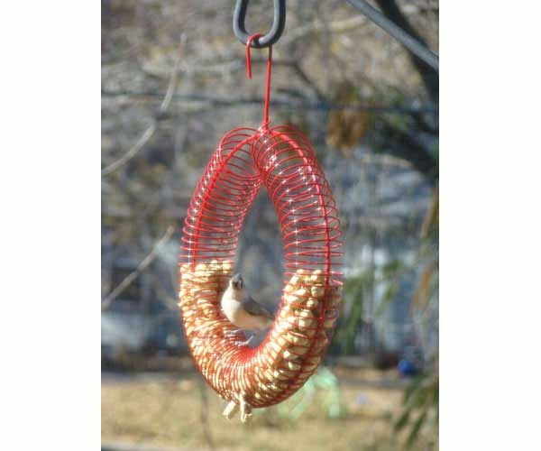 Red wire peanut feeder with in-shell peanuts